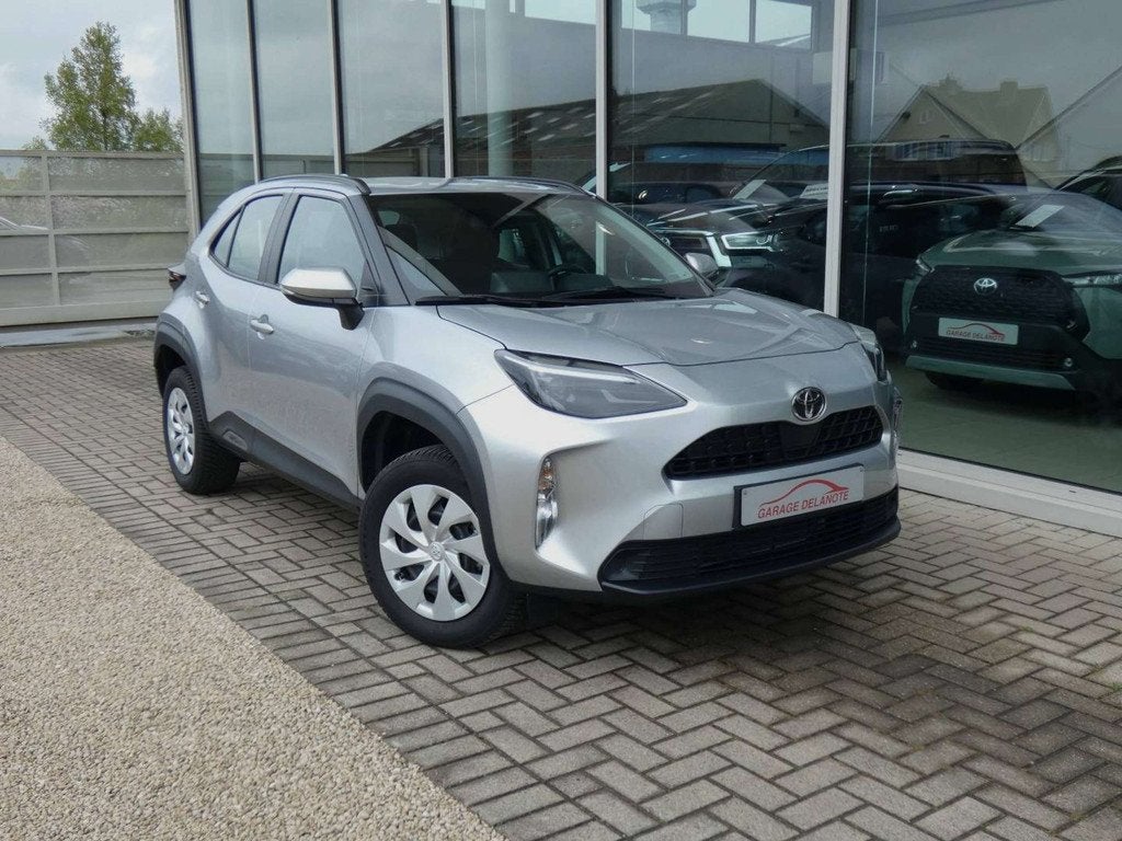 Toyota Yaris Cross 1.5i HYBRID Dynamic +Apple Carplay +Andro, Stof, Gebruikt, Zwart, https://public.car-pass.be/vhr/719be810-42d1-4f9e-a293-233b6b1baeef
