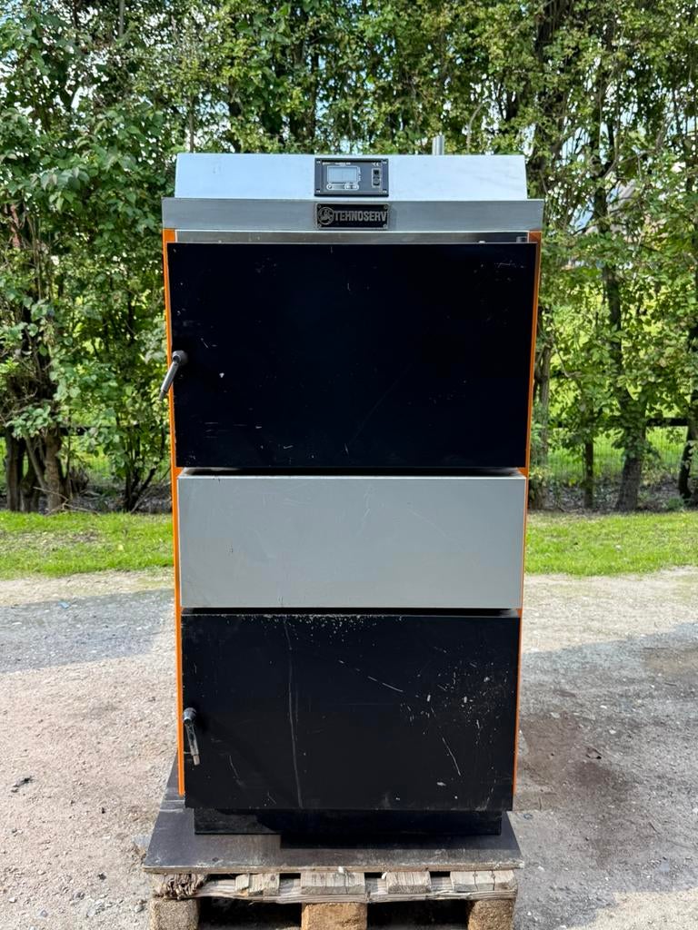 Houtvergasser Tehnoserv 50kw, Gebruikt, Houtkachel, Ophalen of Verzenden, Vrijstaand