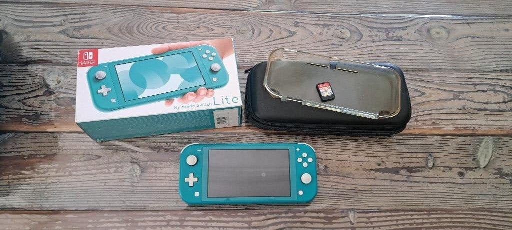 Nette Nintendo switch lite turquoise met etui en game !, Ophalen, Turquoise, Zo goed als nieuw, Met beschermhoes of tas