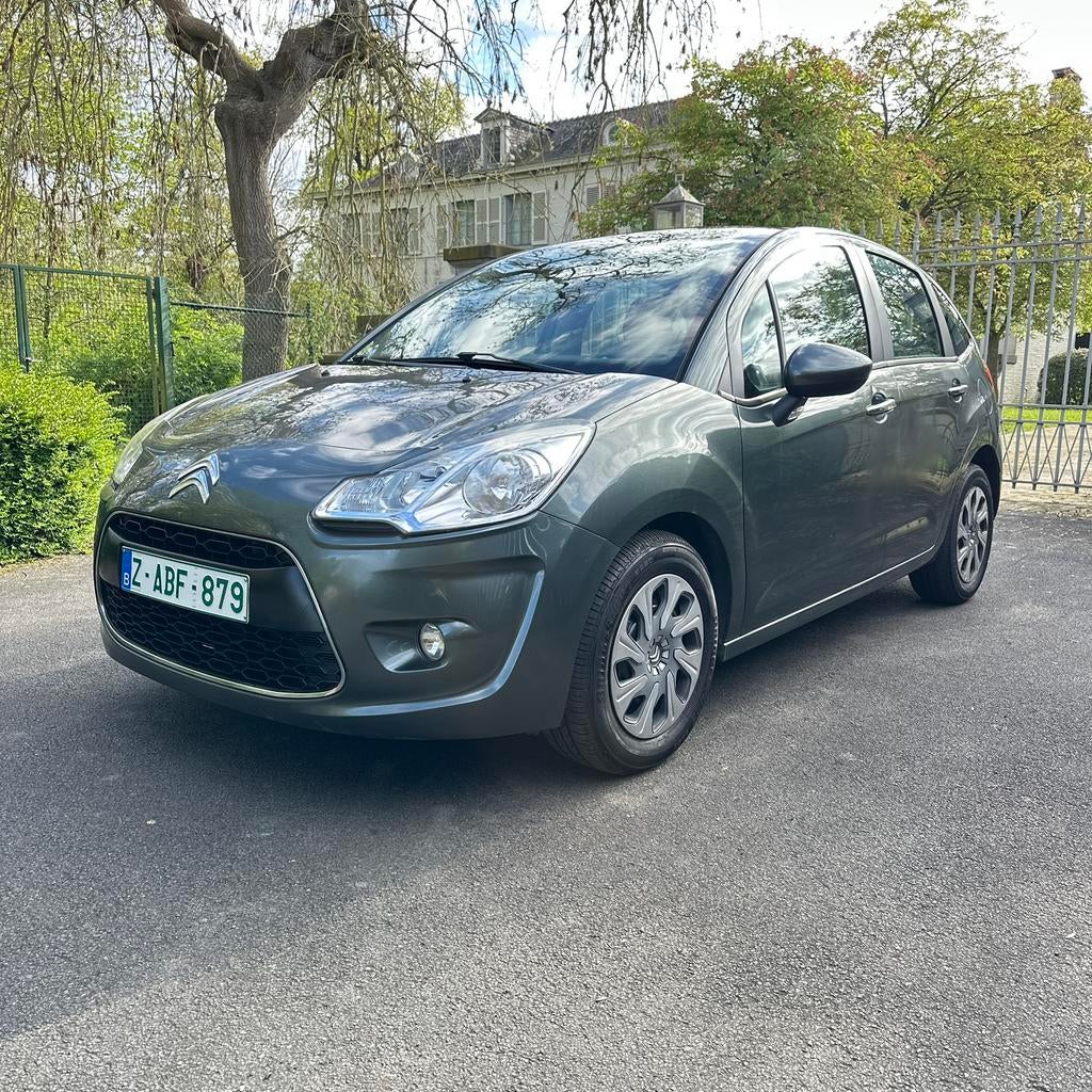 Citroen C3 1.2 Benzine 2013 Met Garantie, Auto's, Citroën, Voorwielaandrijving, Euro 5, Stof, Zwart