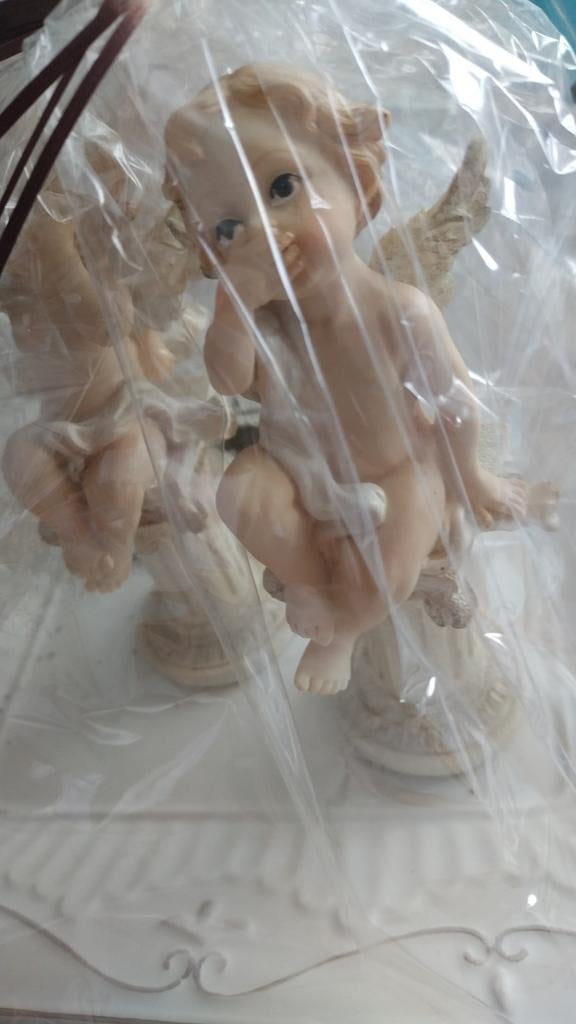 Decoratie engeltjes, Ophalen