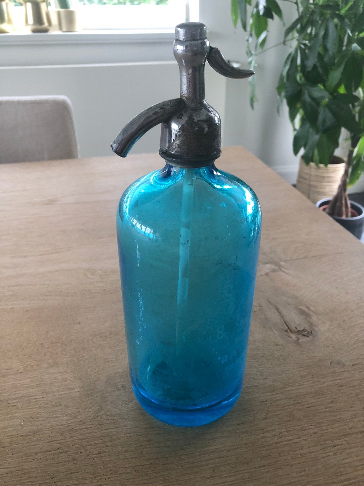 Antieke spuitfles, Ophalen