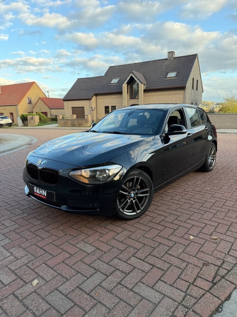 BMW 1-serie, 1 Reeks, https://public.car-pass.be/vhr/b4aef087-5930-48dc-82fa-4f6e67d790d5, Zwart, Bedrijf