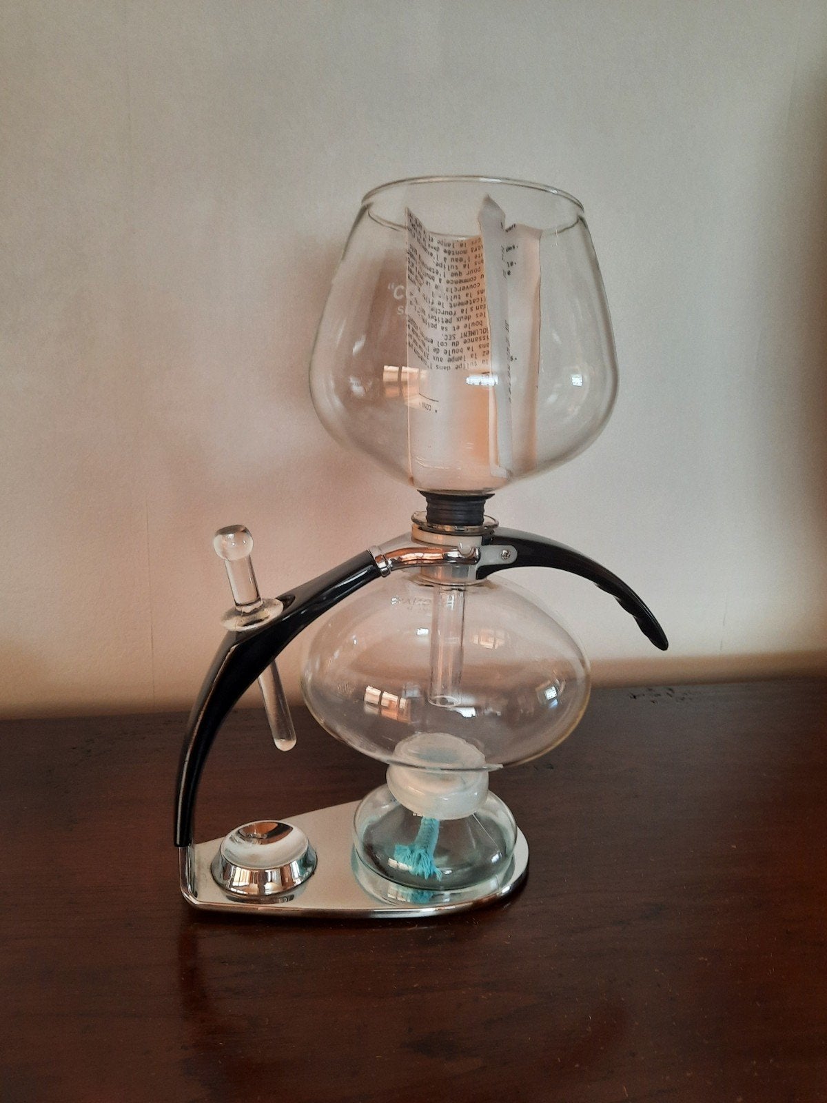 Cona koffiemachine, Ophalen