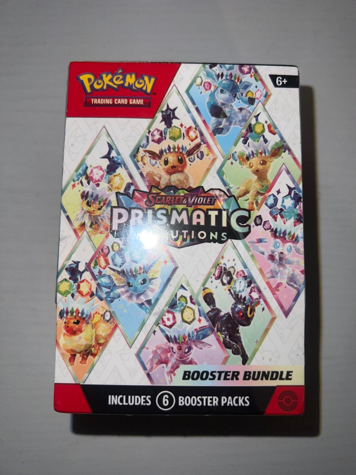 Pokemon box Prismatic Evolution, Envoi, Comme neuf