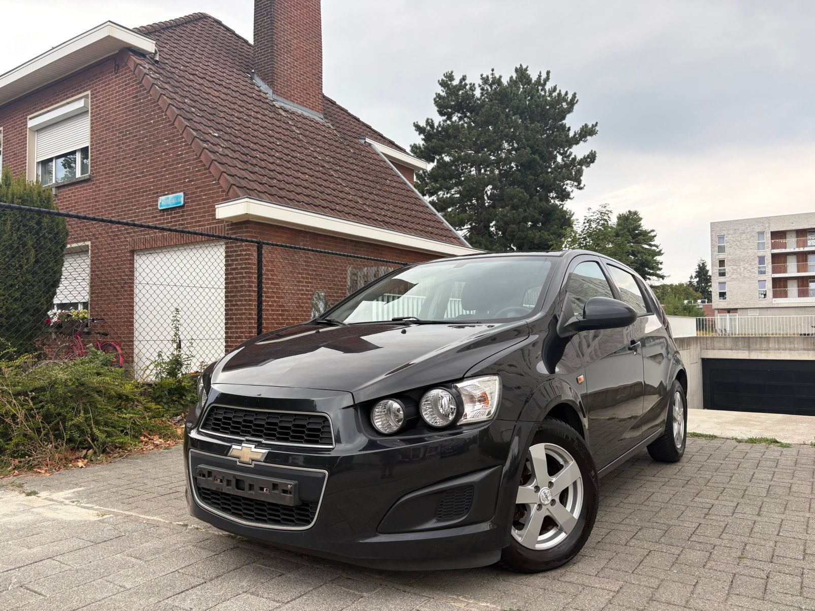 Chevrolet Aveo / 133000km / Benzine / Airco / 2013, Auto's, Euro 5, Zwart, Handgeschakeld, 5 deurs