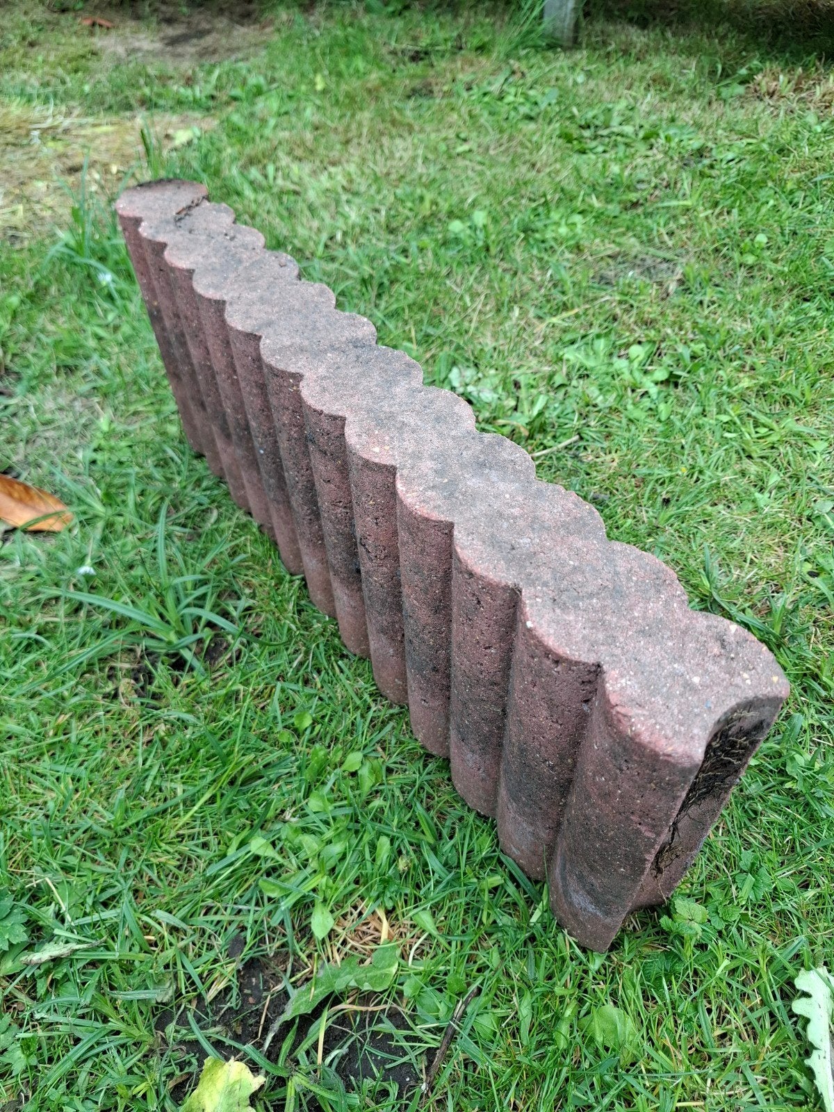 Boordsteen palissadebanden tuinrand, Ophalen