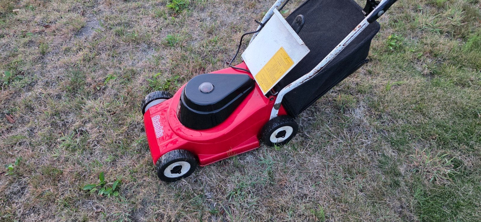 kleine electrische grasmaaier., Enlèvement