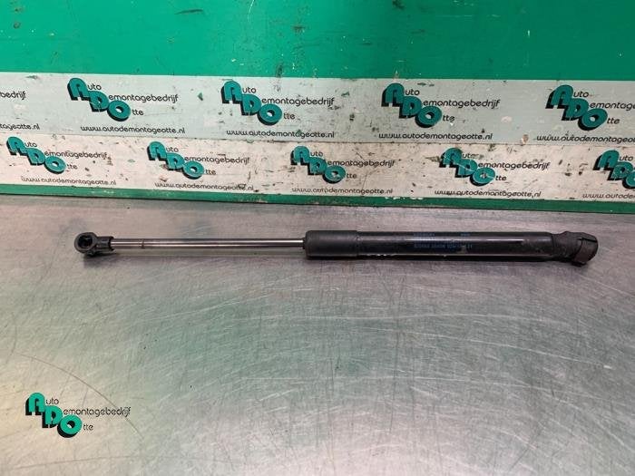 Amortisseur capot moteur gauche d'un Volkswagen Caddy (Caddy, Volkswagen, -, 3 mois de garantie, Utilisé