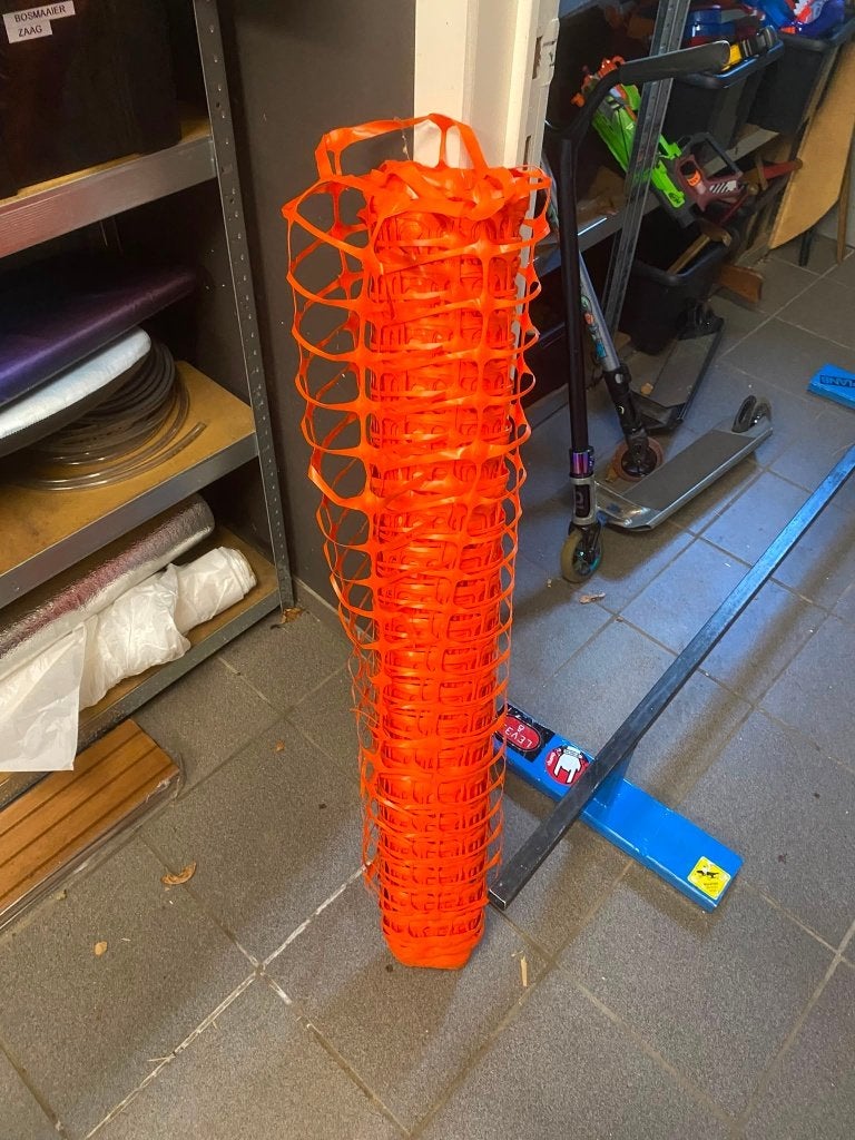 Oranje werfafsluiting / veiligheidsnet, Ophalen