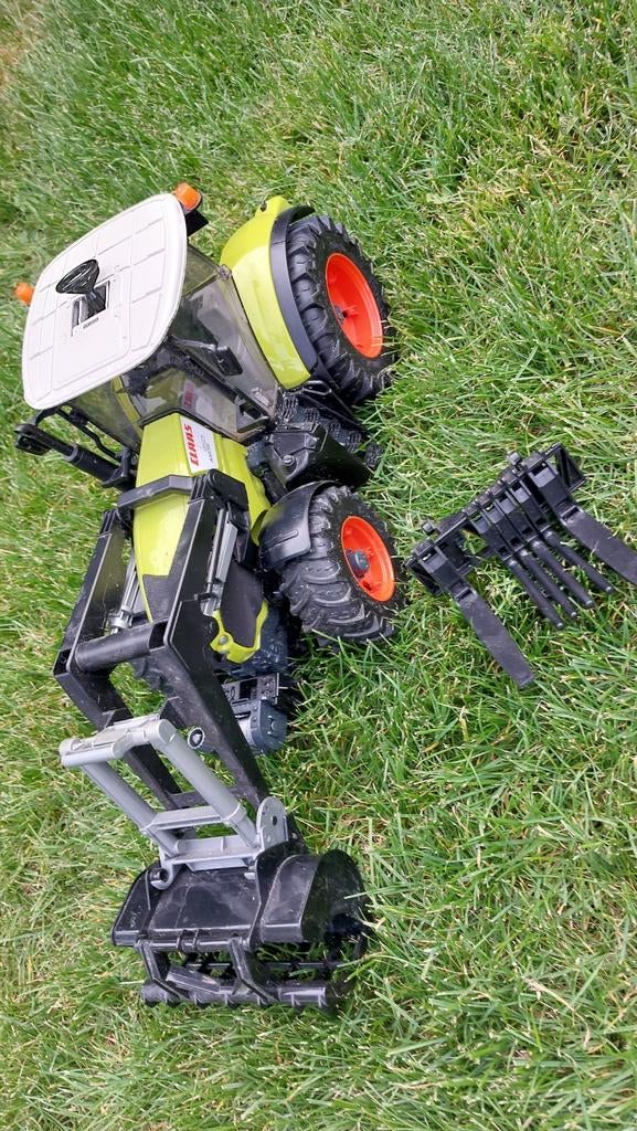 Bruder Claas Axion 950 tractor met voorlader, Ophalen