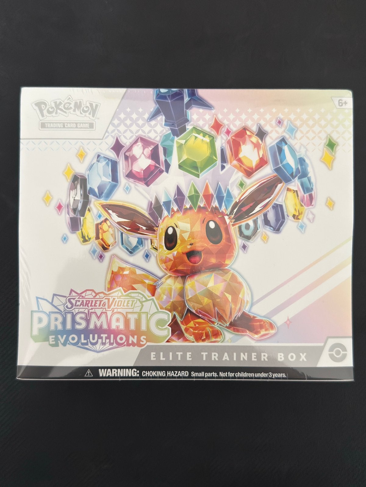 Pokemon Prismatic Evolutions ETB Sealed, Ophalen of Verzenden, Zo goed als nieuw