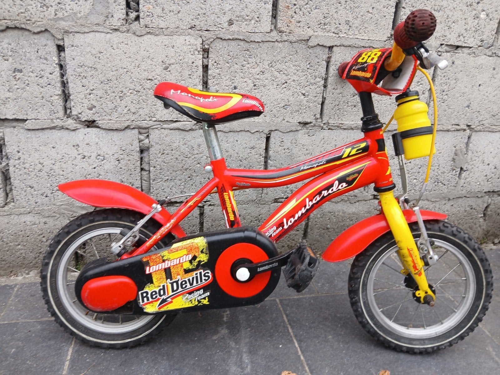 kinderfiets 12inch lombardo red devils, Frein sur jante, Enlèvement, Utilisé, Lombardo