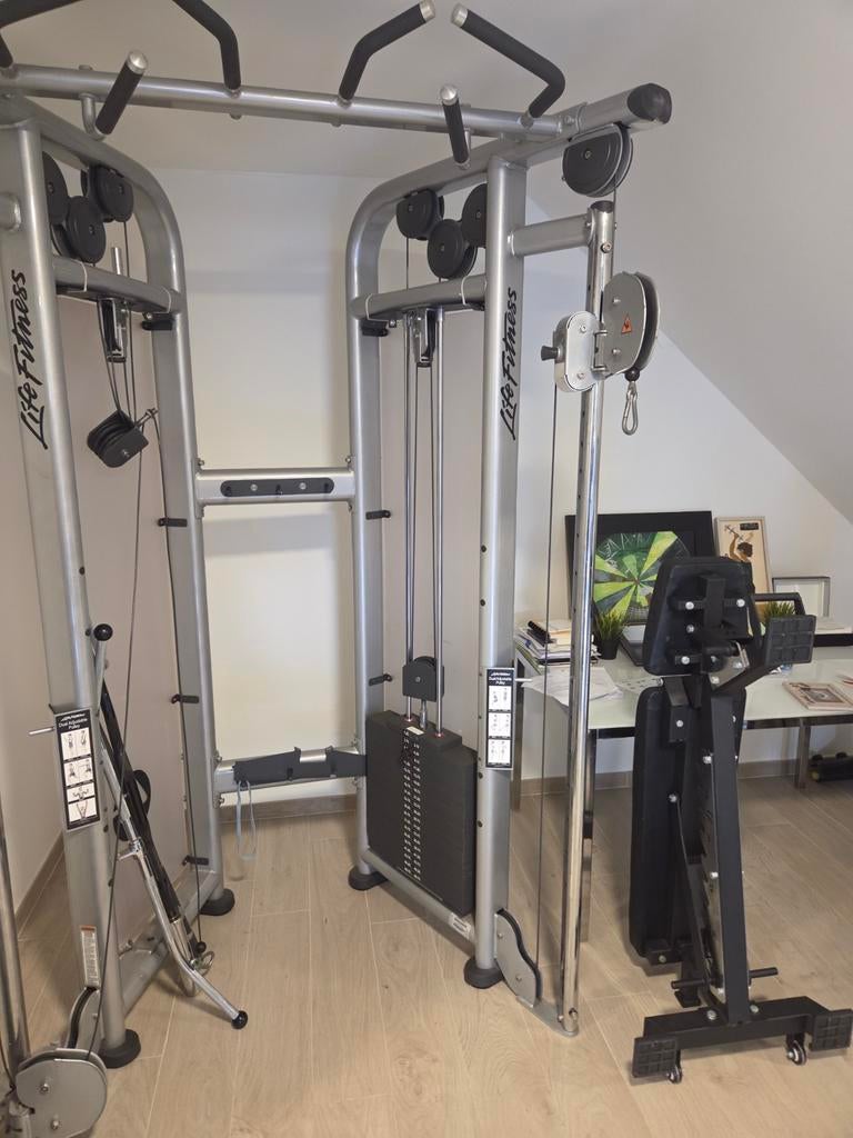 Dual adjustable pulley kabel machine life fitness, Sport en Fitness, Fitnessmaterialen, Zo goed als nieuw, Overige typen, Armen