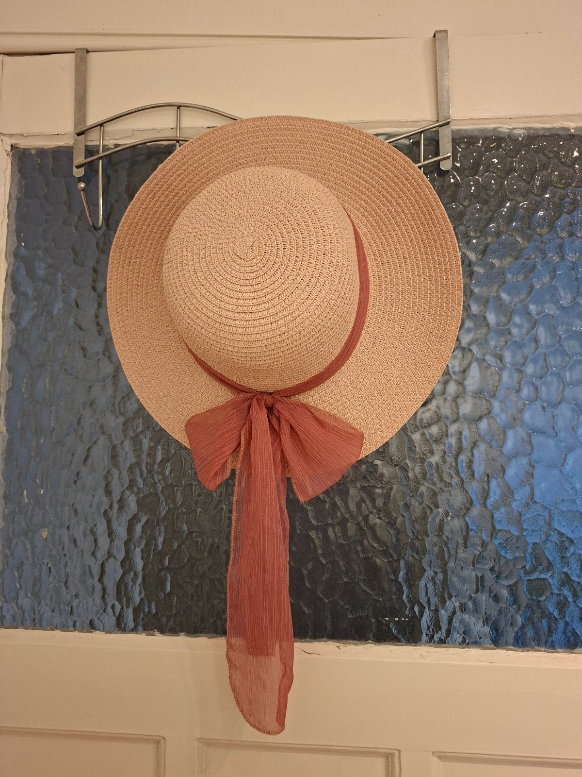 Elegante rieten zomerhoed met roze strik, Ophalen