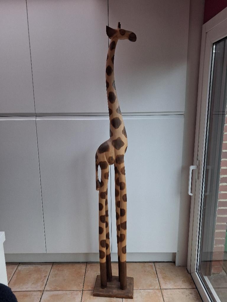 Houten giraf, Ophalen