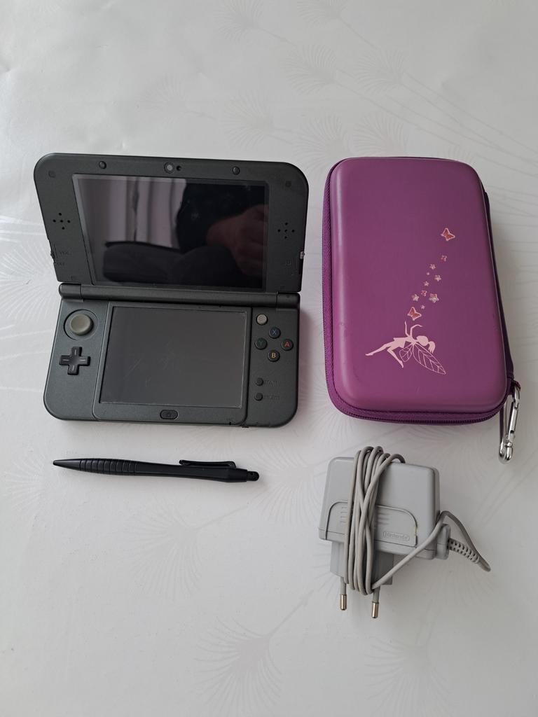 Het Nintendo New 3DS XL-systeem werkt goed. Geen spelletjes, Ophalen of Verzenden, Zo goed als nieuw, 3DS