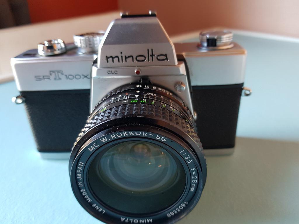Reflexcamera Minolta SRT100x, 3 lenzen, 4 filters + tas, Enlèvement, Utilisé, Reflex miroir, Minolta
