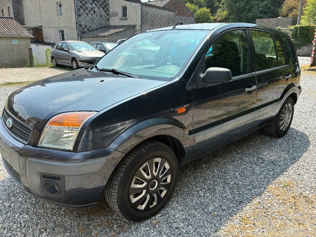 Ford Fusion | 2006 | 171.835 km | Diesel | 2.200€, Auto's, Stof, 50 kW, Zwart, Fusion