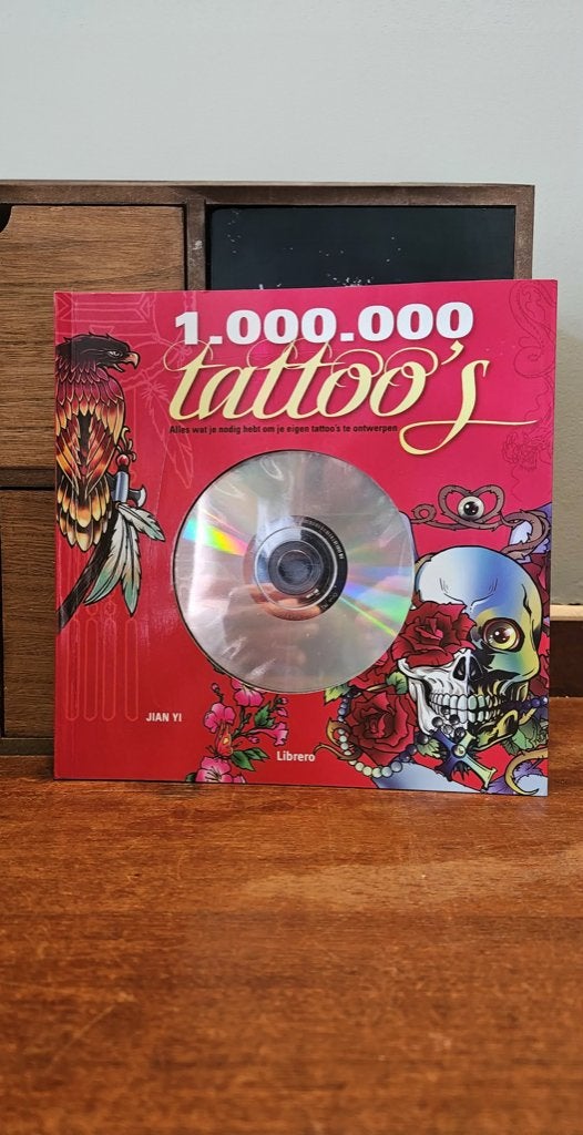 1.000.000 Tattoo's – Jian Yi – inclusief ongebruikte CD-ROM, Ophalen of Verzenden, Zo goed als nieuw