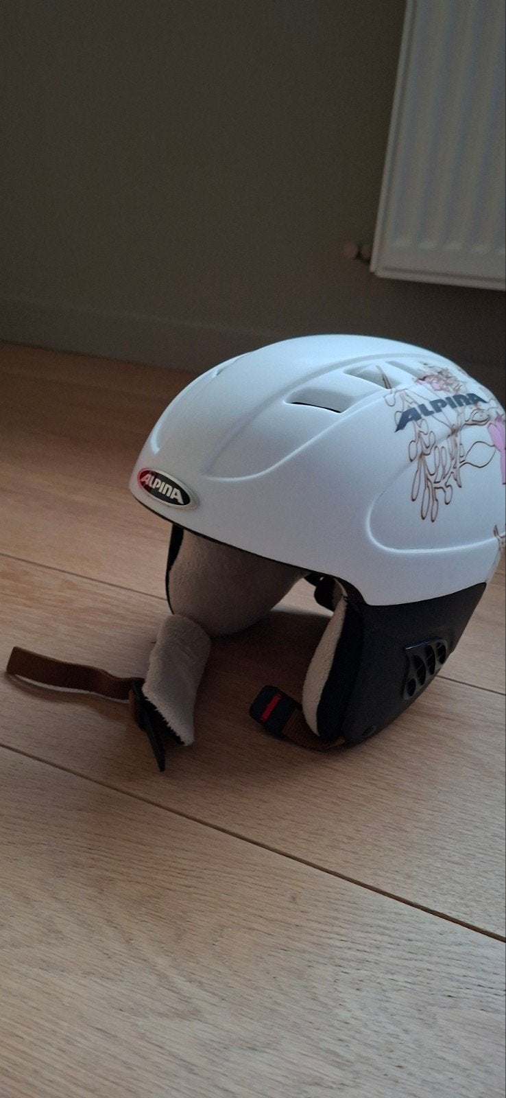 Skihelm dames Alpina, Ophalen