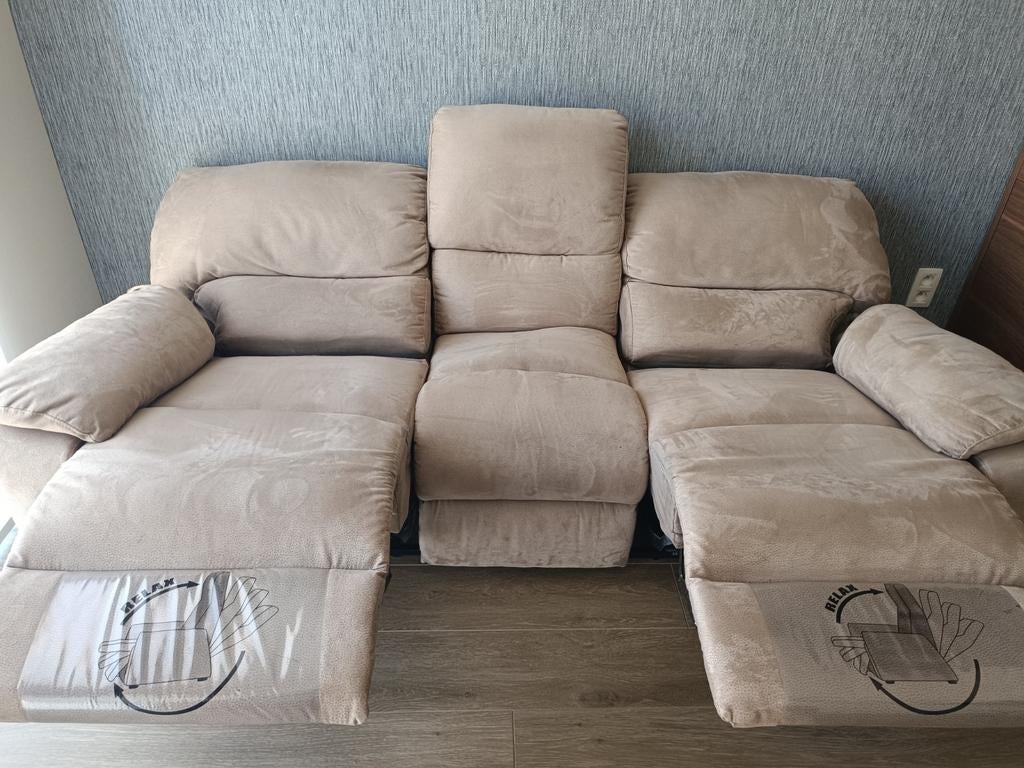 Mooie drie-zit met ingebouwde relax, Ophalen