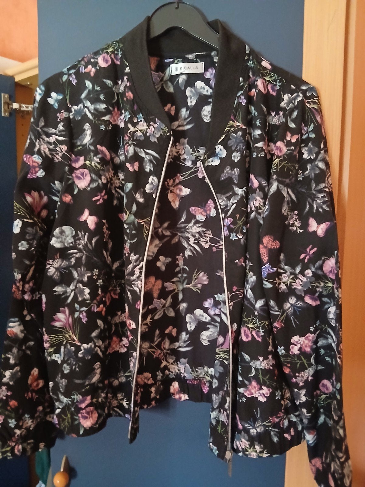 Bloesje large rits, Ophalen