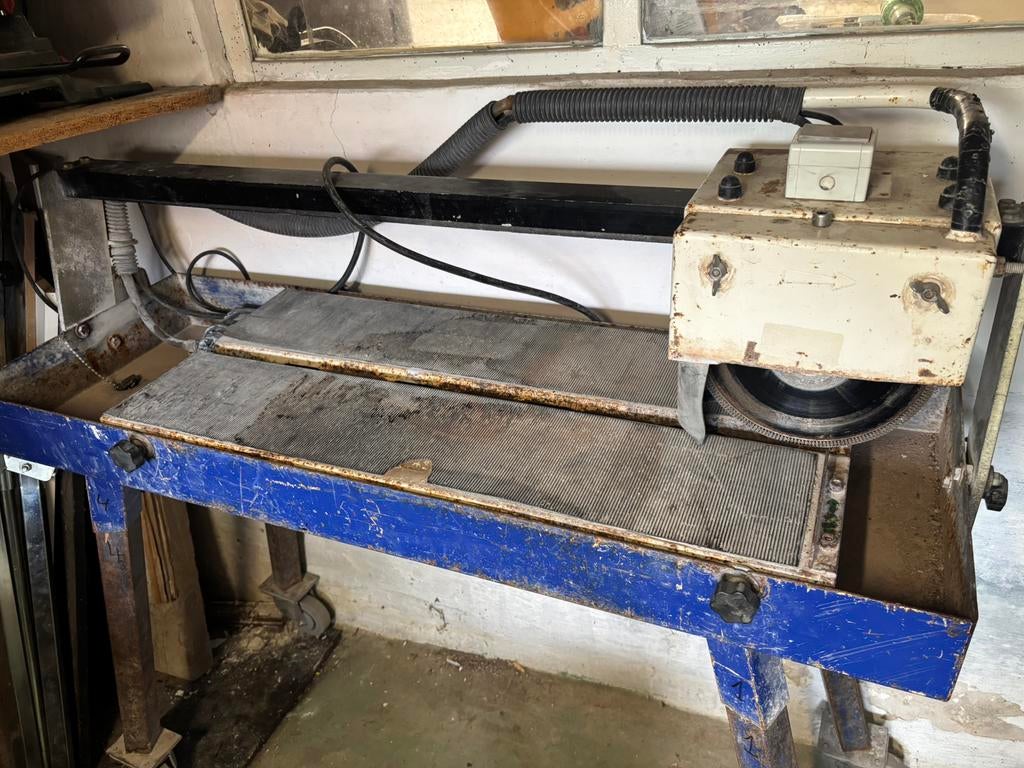 Tegelzaag / tegelsnijder, Enlèvement