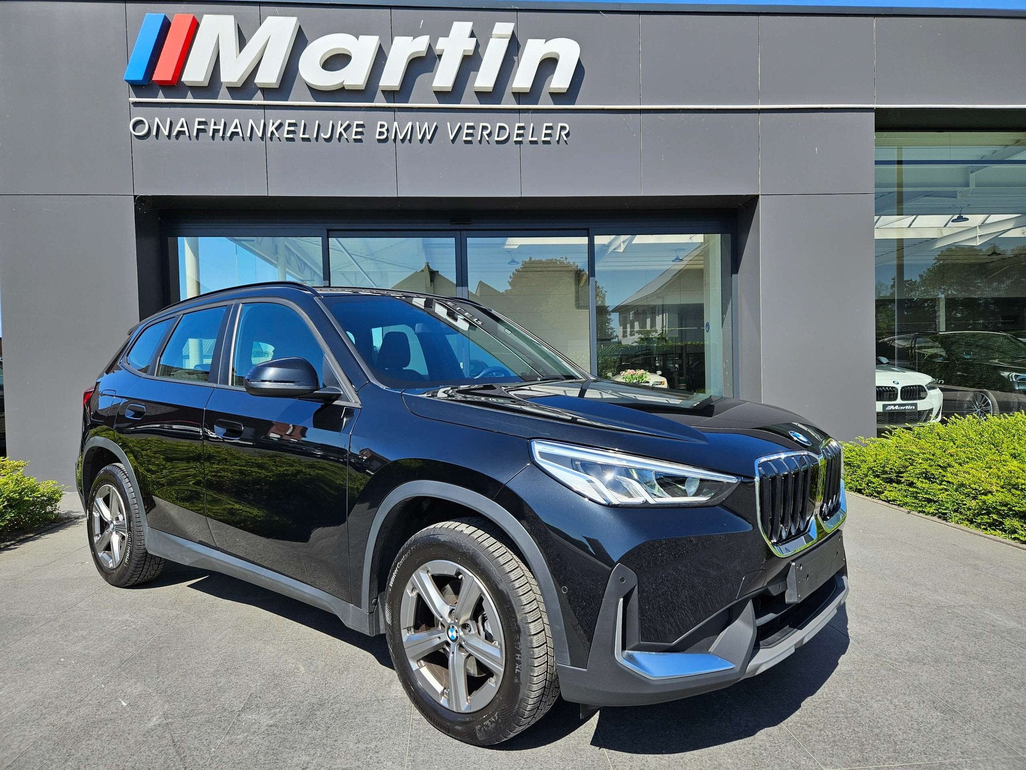 BMW X1 sDrive18iA Automaat/ Camera / PDC V+A / Widescreen, Auto's, BMW, 135 pk, Stof, Gebruikt, Zwart