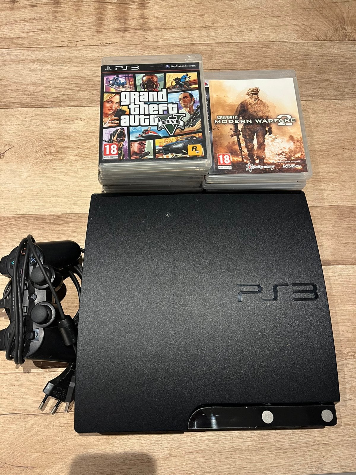 PS3 Slim noire + manette + câbles + 14 jeux –, Consoles de jeu & Jeux vidéo, Enlèvement, Comme neuf, Slim