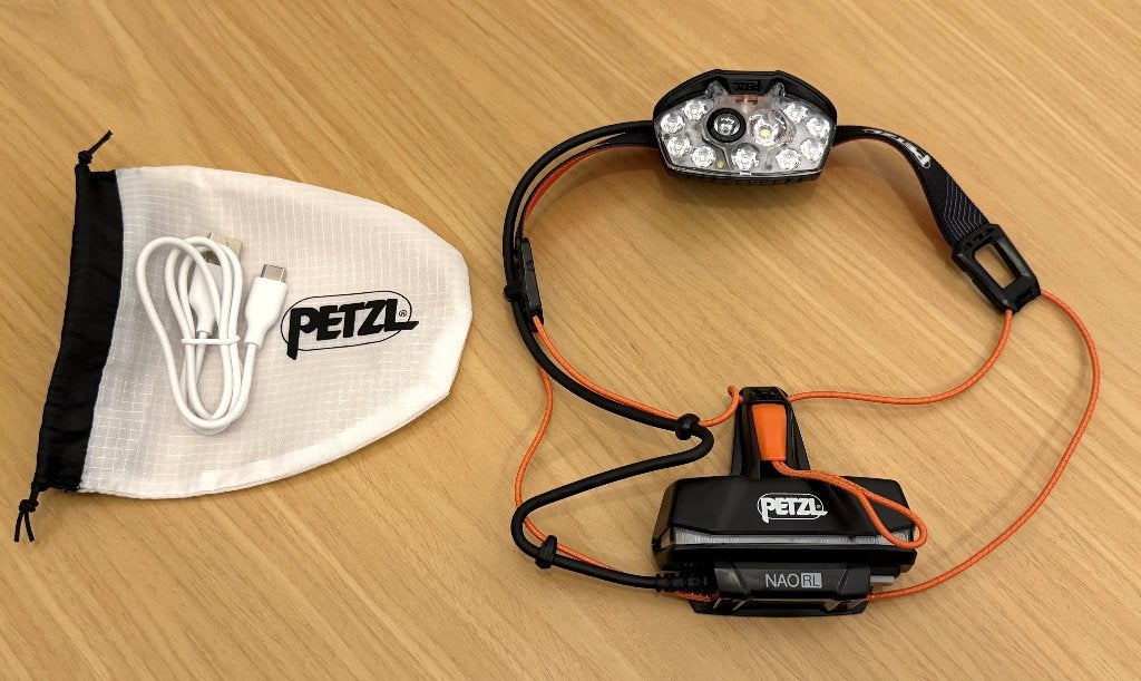 Petzl  Hoofdlamp Nao Rl Rechargeable 1500 Lumen, Ophalen of Verzenden, Zo goed als nieuw, Accu