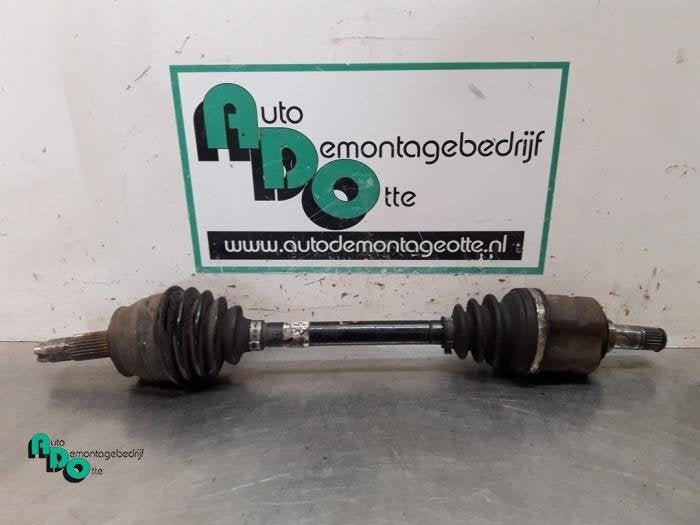 Arbre de transmission avant gauche d'un Opel Corsa (Corsa D, -, Opel, 3 mois de garantie, Utilisé