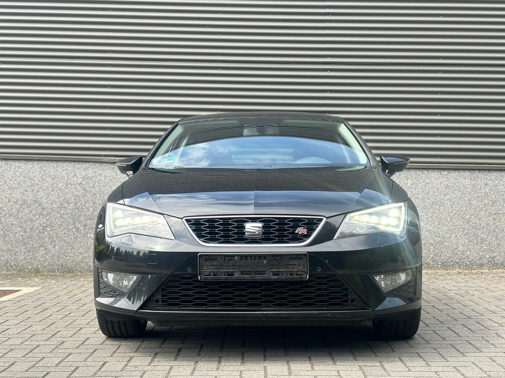 Seat Leon 1.4 benzine FR Editie, Zwart, 4 cilinders, Leon, Leder en Stof