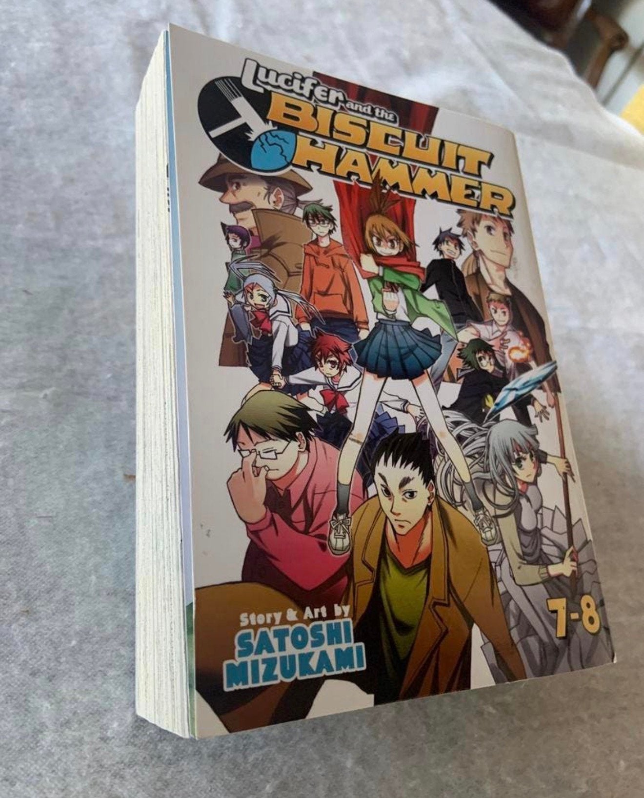 Bande dessinée XL Lucifer et le marteau à biscuits, vol. 7-8, Une BD, Enlèvement ou Envoi, Comme neuf