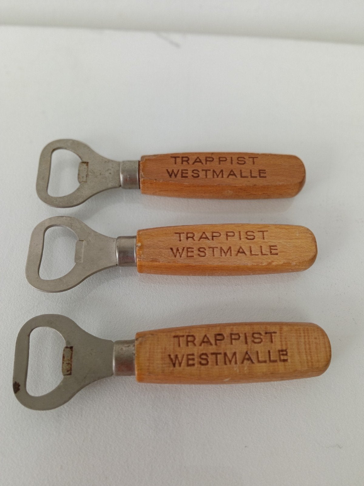 €2 voor 3x Westmalle flesopener flessenopener kroontjeswippe, Ophalen of Verzenden, Flesopener