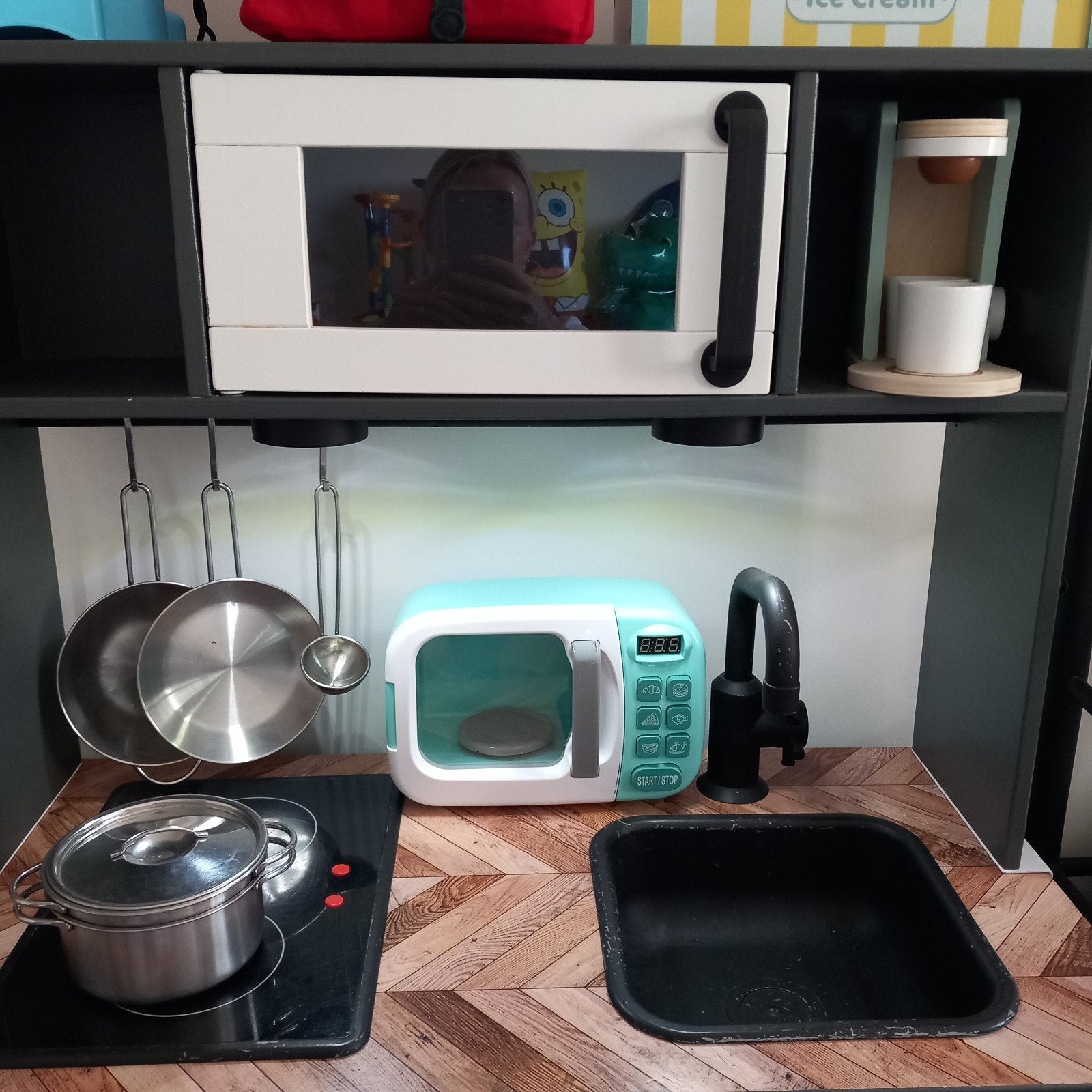 speel keukentje met toebehoren, Ophalen