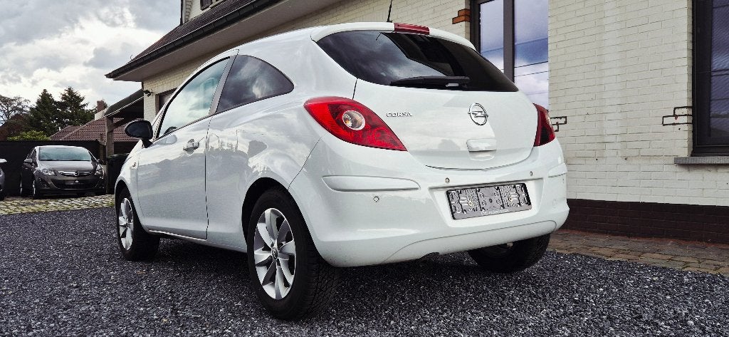 Opel Corsa 1.2i-PDC-Bleutooth-Cruise Control-Navigatie-12MGA, Auto's, Opel, Voorwielaandrijving, Euro 5, Stof, 4 cilinders