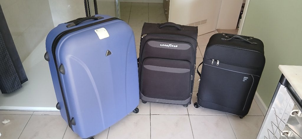 Reiskoffers, Ophalen, Zo goed als nieuw, Slot