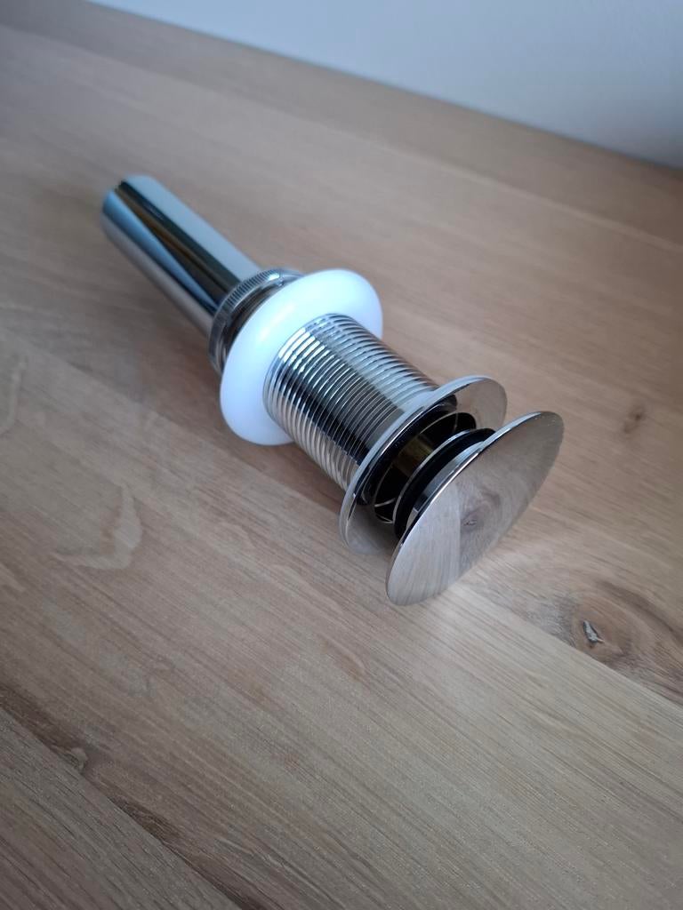Afvoer plug kliksysteem, Ophalen