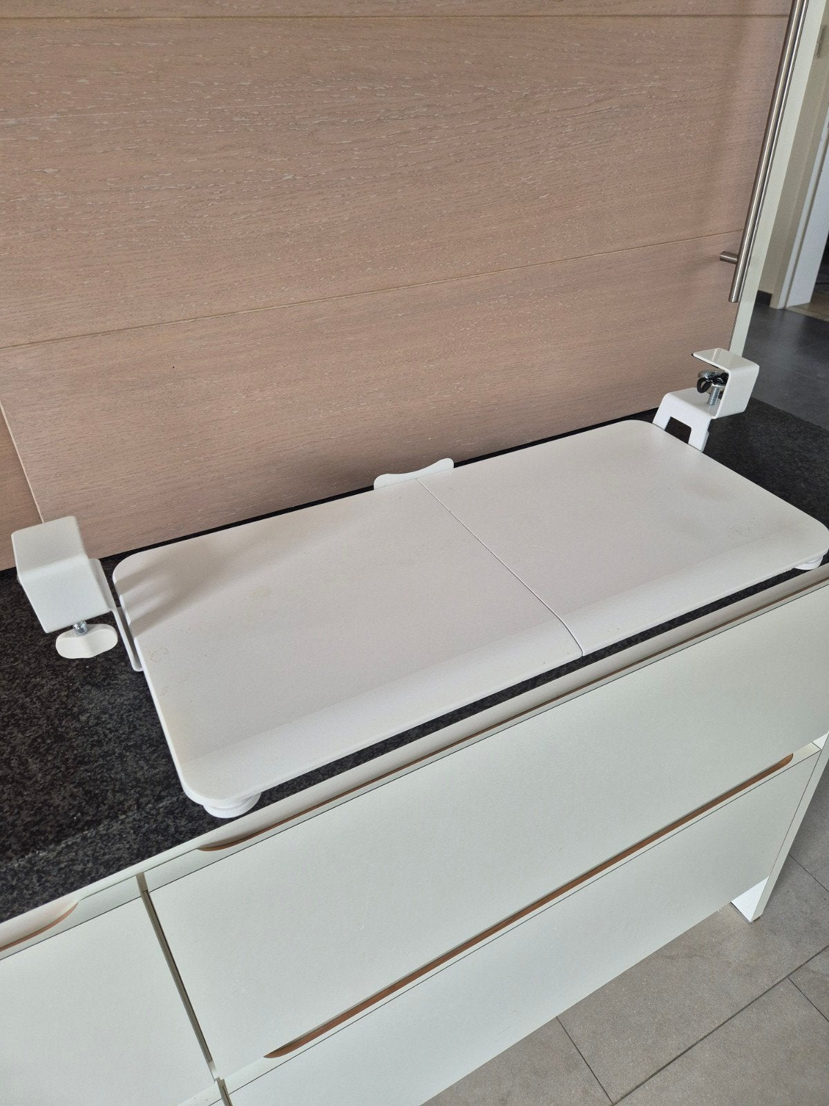 uitschuifbare plank voor toetsenbord, Ophalen