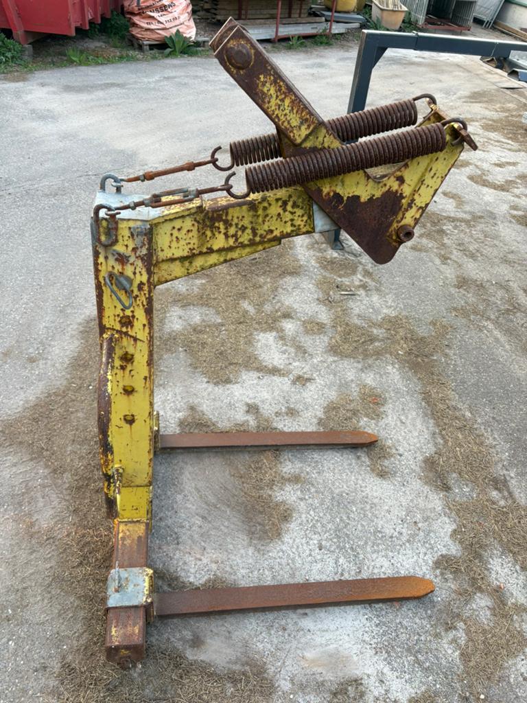 Pallethaak stoel bouwkraan, Enlèvement