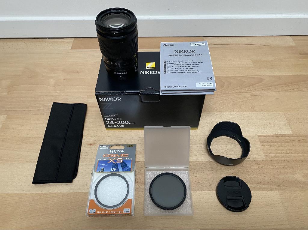 Nikkor Z 24-200 mm F 1:4-6.3 + UV + ND filter, Audio, Tv en Foto, Foto | Lenzen en Objectieven, Ophalen of Verzenden, Zo goed als nieuw