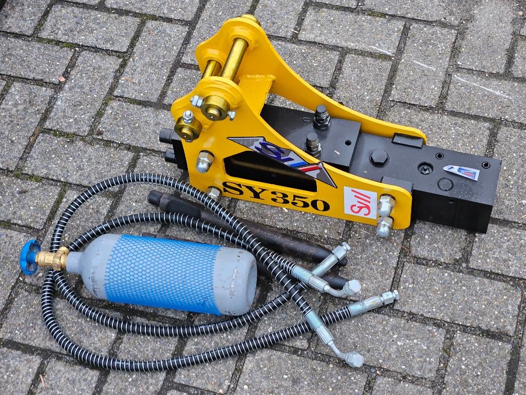 Hydraulische breekhamer voor minigraver, Enlèvement