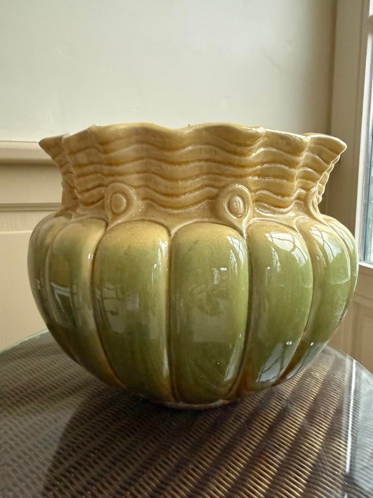 Cache-pot, Ophalen
