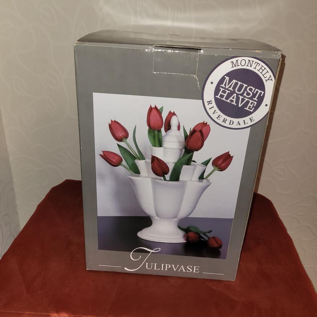 Bloemenvaas om elke bloem apart in te zetten, Ophalen