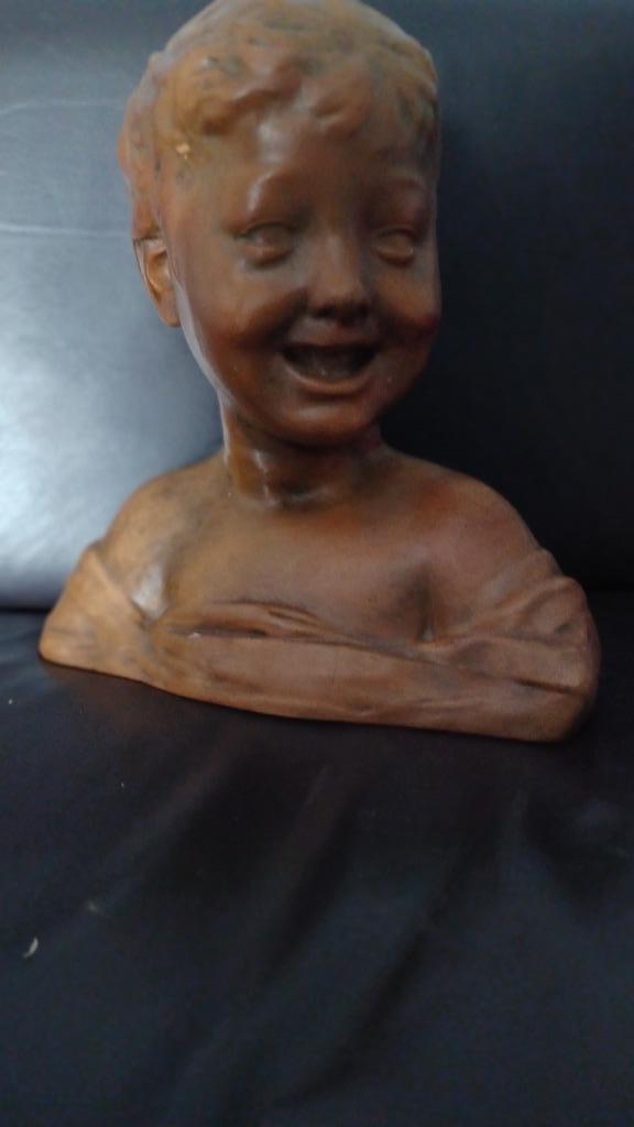 Buste enfant rieur, Ophalen