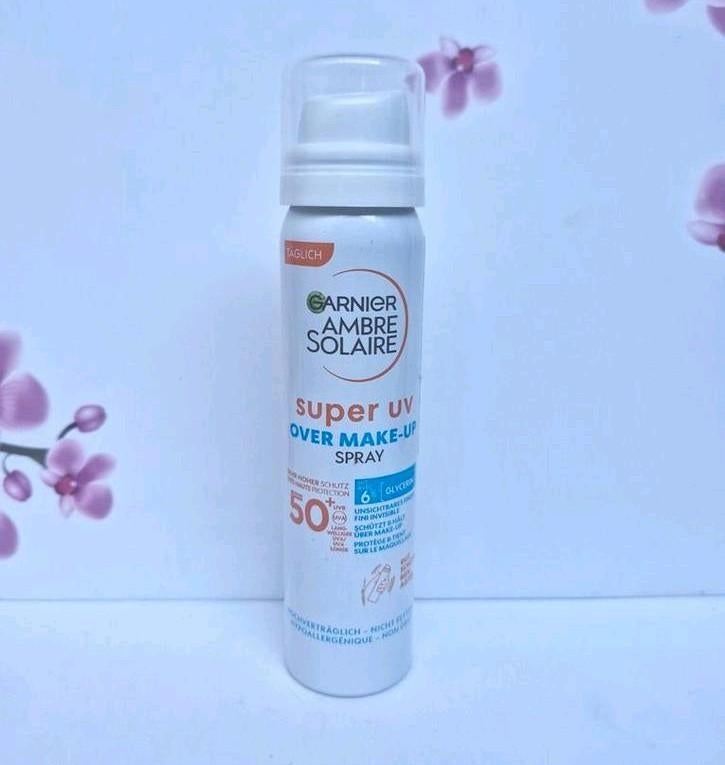 🤍 Spray de maquillage Garnier Ambre Solaire Super UV SPF 50, Enlèvement ou Envoi, Neuf, Tout le visage, Autres types