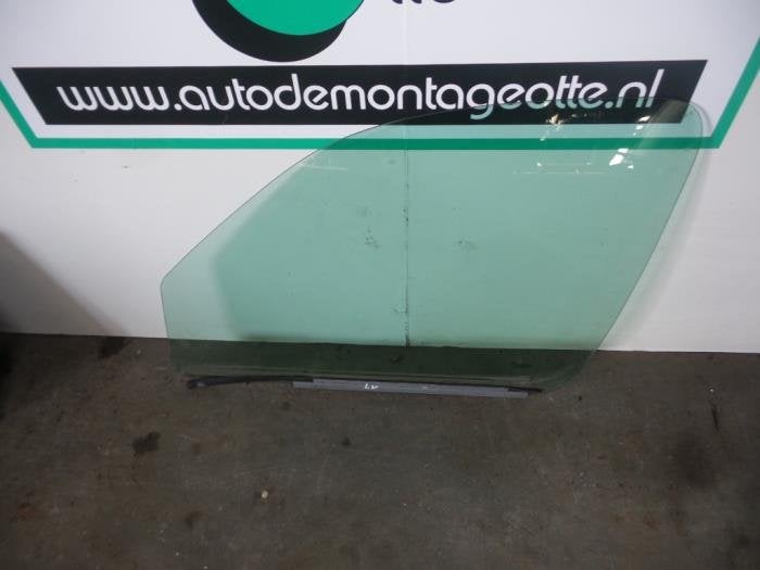 Vitre portière 2portes gauche d'un Renault Kangoo (Kangoo 0, Renault, -, Utilisé, -