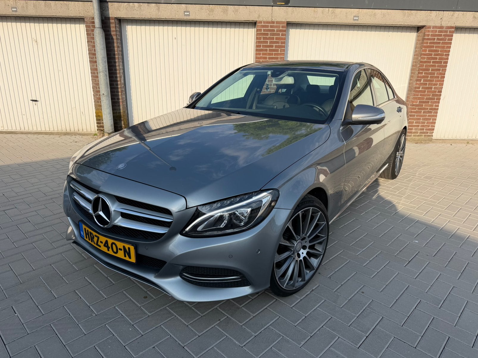 Mercedes-Benz C180 Bsns Plus AUT|Stoelvw|Parkeerassist.|Navi, Auto's, Automaat, Stof, Euro 6, 4 cilinders