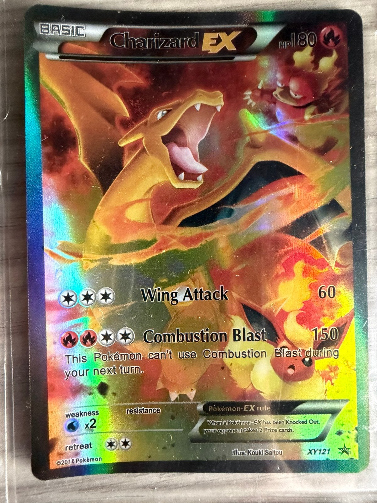 Charizard EX XY121 promo, Ophalen of Verzenden, Zo goed als nieuw, Losse kaart, Foil